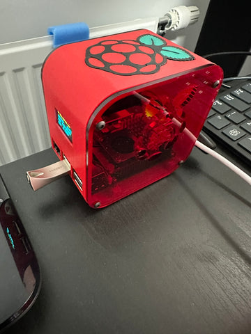A Raspberry Pi 5 Desktop Case Kit with OLED Display and PWM Fan